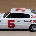 Close-up of the custom-built 1966 Dodge Charger NASCAR model car showcasing detailed roll cage and interior.