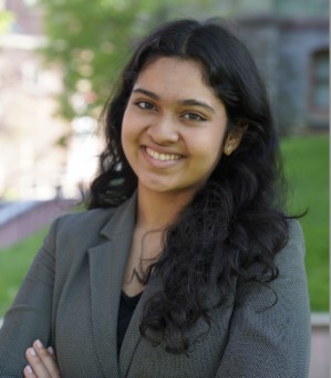 Anushka Kulkarni smiling in a light blue top, representing her positive experience during the WRAP program in Italy.