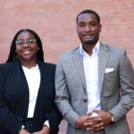 Jackson State University students Charity Hayman and Dillard McCoy at TIAA's Charlotte office during their Early Career Immersion Program internships.