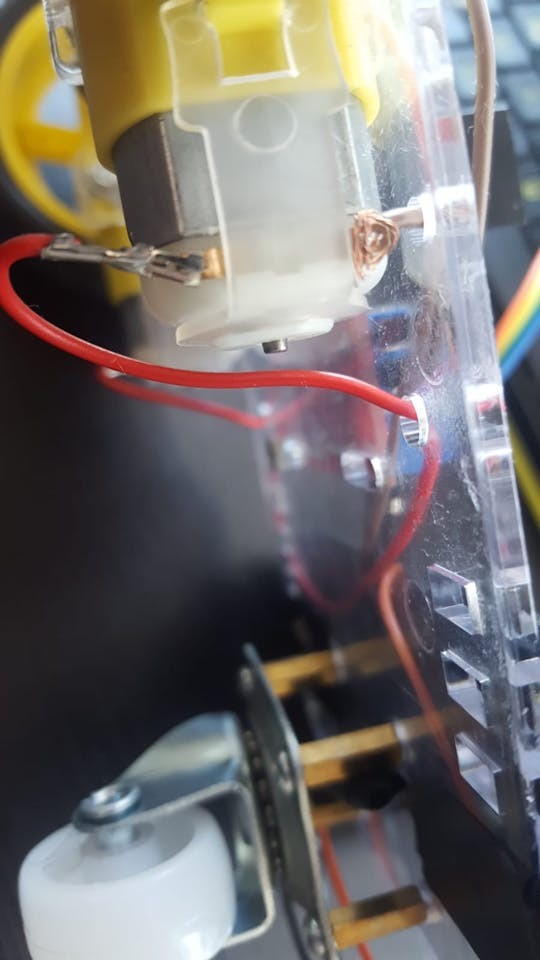 Connecting wires to DC motor pins for Arduino RC car project