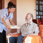 Aged care support program providing in-home meal assistance for a senior, highlighting home care services for the elderly.