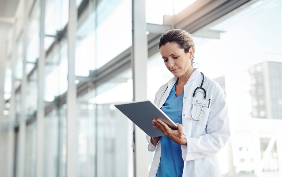 Healthcare professionals in a meeting, discussing patient care strategies