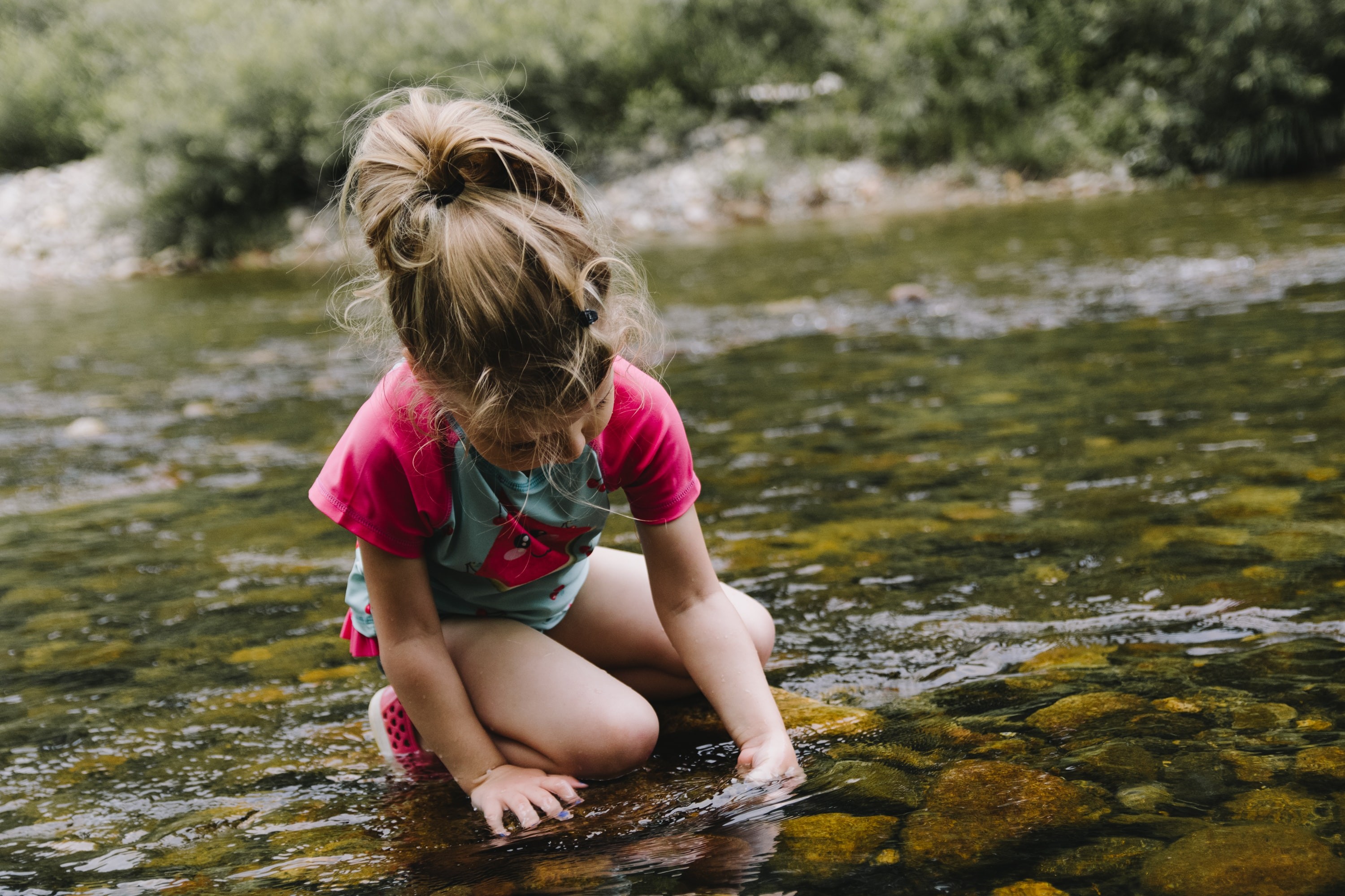 Children exploring nature and engaging in outdoor activities at Ardenwald Preschool