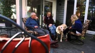 Veterans and caregiver enjoying outdoor time in a medical foster home, highlighting the home-like environment of the medical foster care program for veterans.