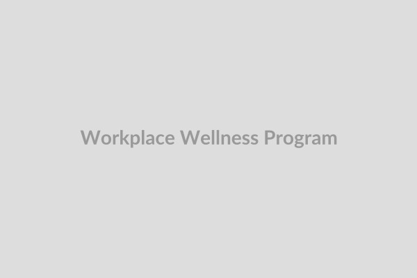 Diverse employees participating in a wellness program at their workplace, promoting healthy lifestyle choices