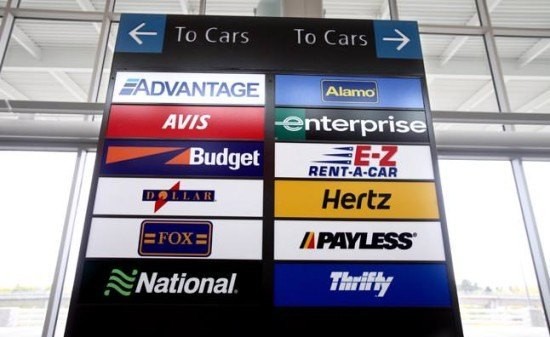 Rental car signs pointing in different directions, questioning which one to choose. It gets harder and harder.