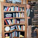 Tom Somilinski received a quilt from staff and students as a token of appreciation for his time at Arlington Career Center.