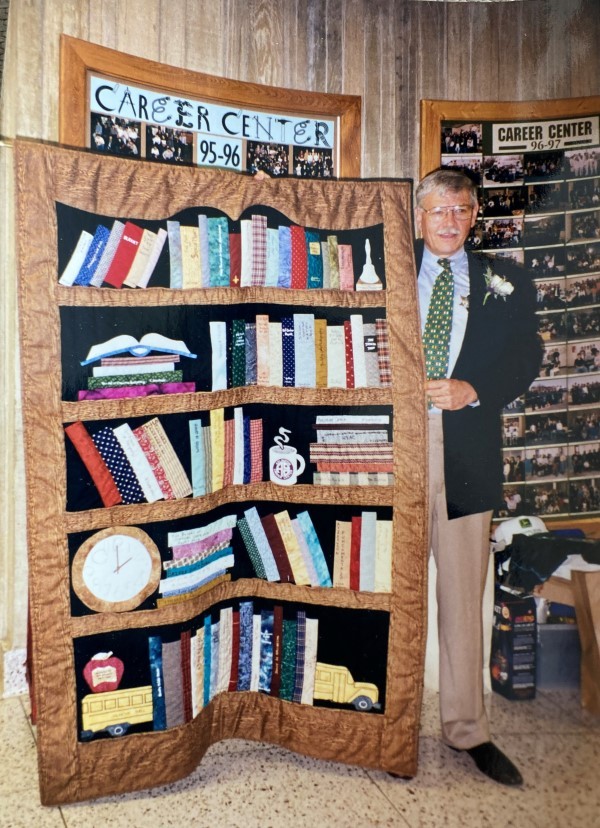 Tom Somilinski received a quilt from staff and students as a token of appreciation for his time at Arlington Career Center.